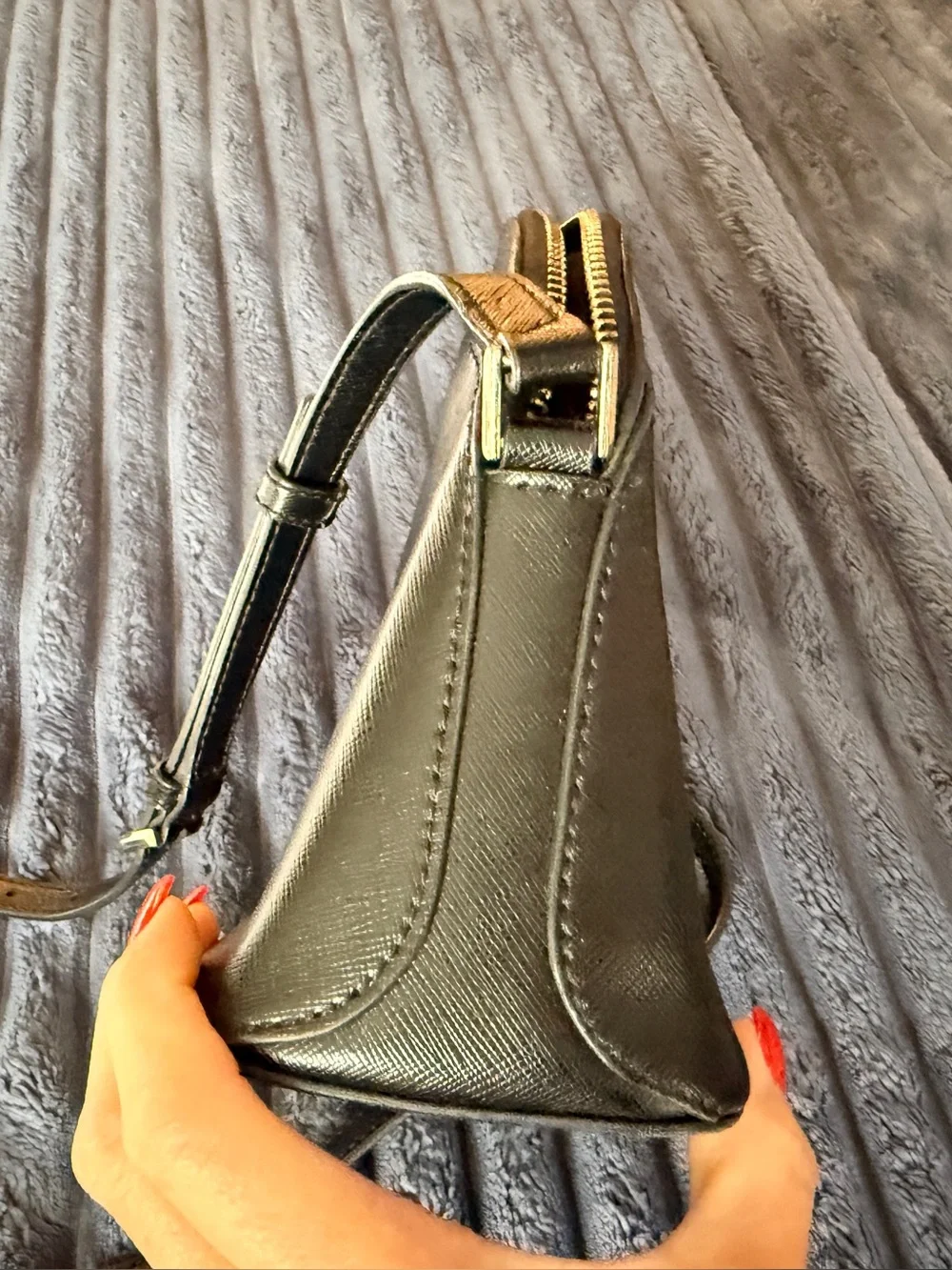 Kate Spade New York Payton Dome Crossbody in black saffiano leather.